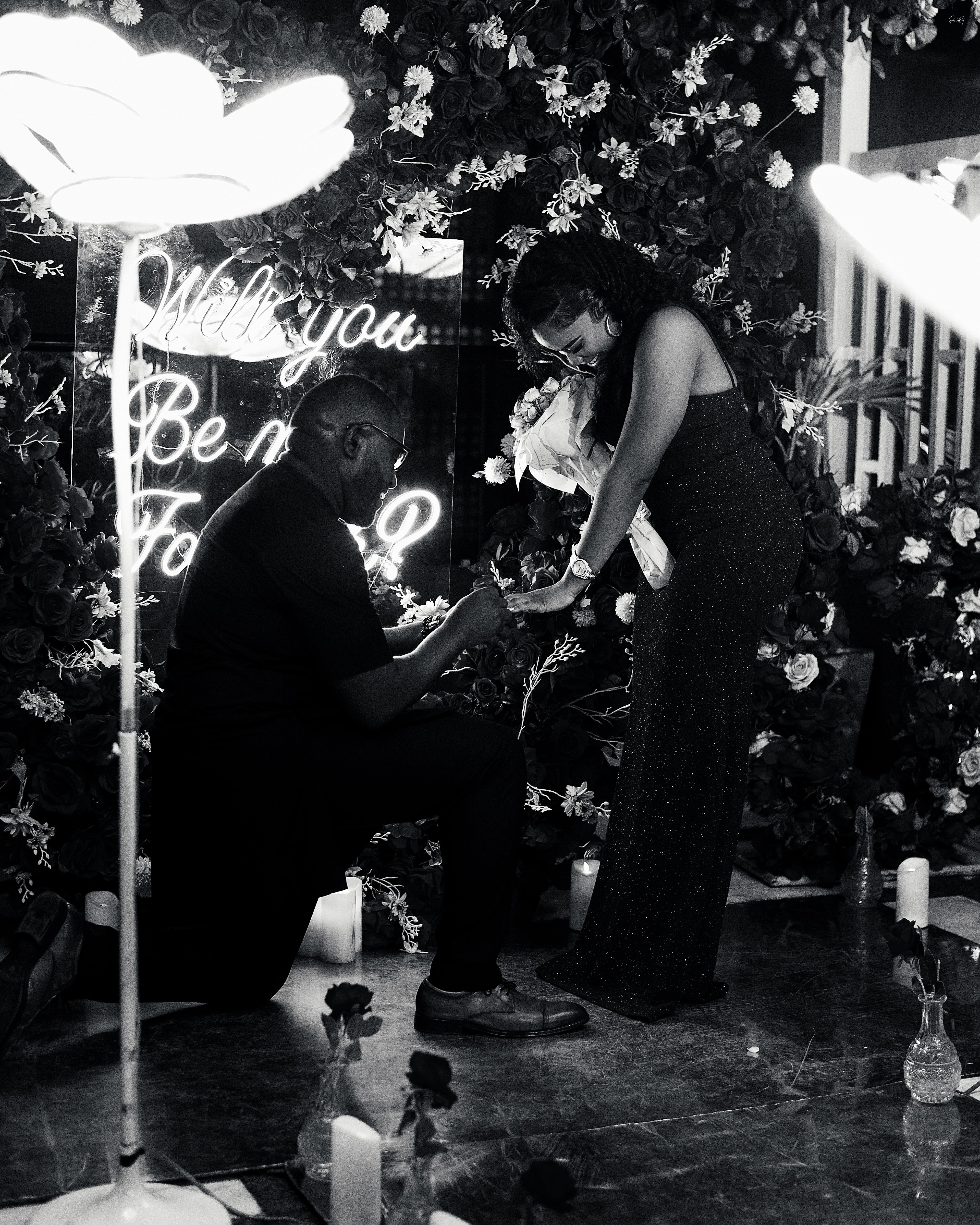 Romantic black and white proposal moment