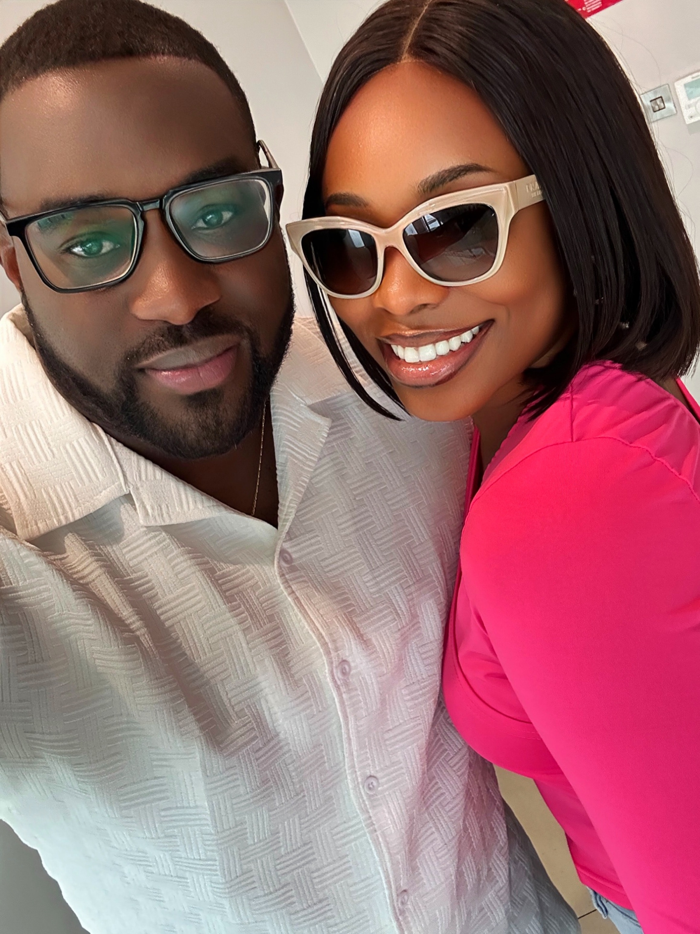 Casual selfie of Semilore and Dayo with glasses