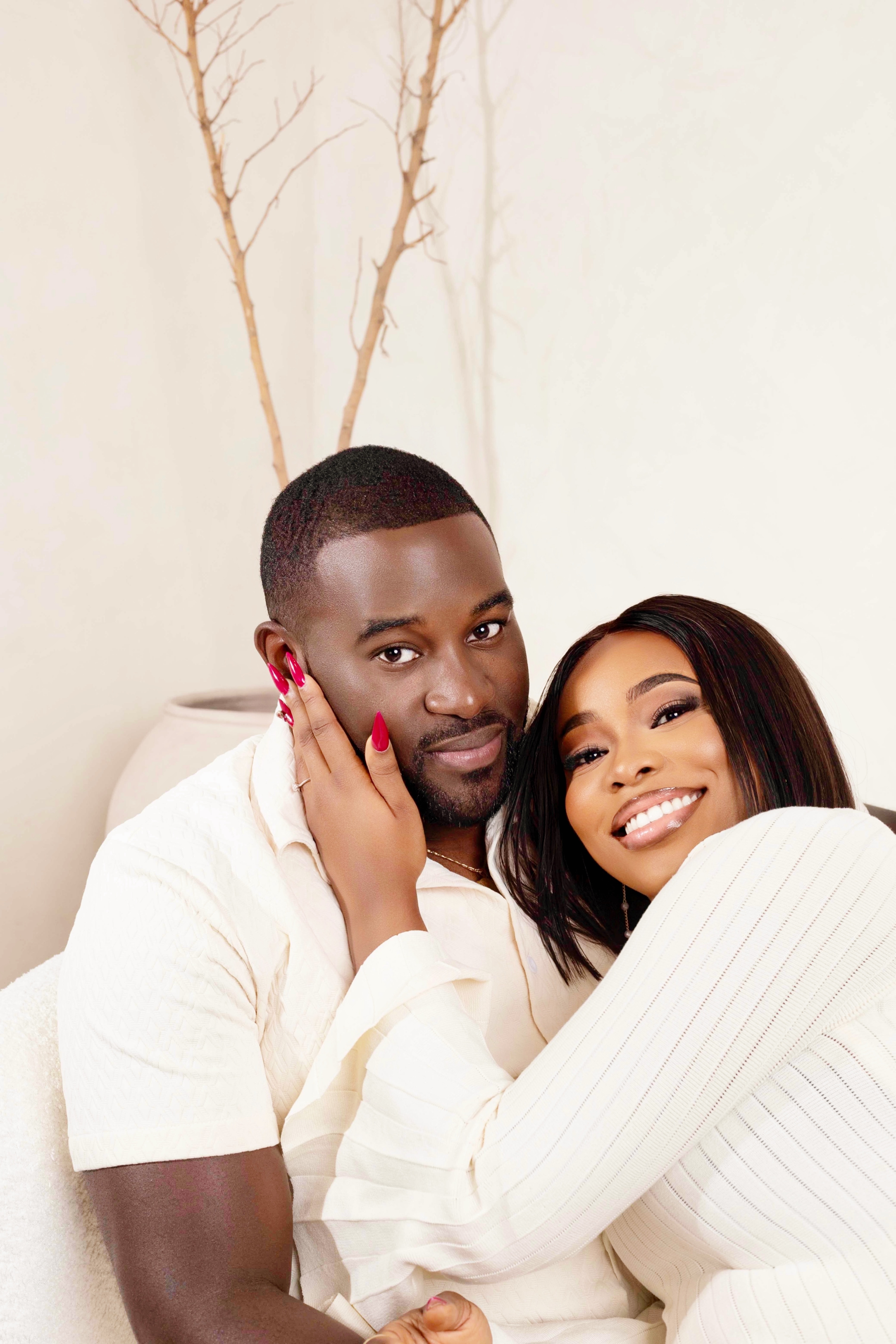 Semilore and Dayo in elegant cream outfits